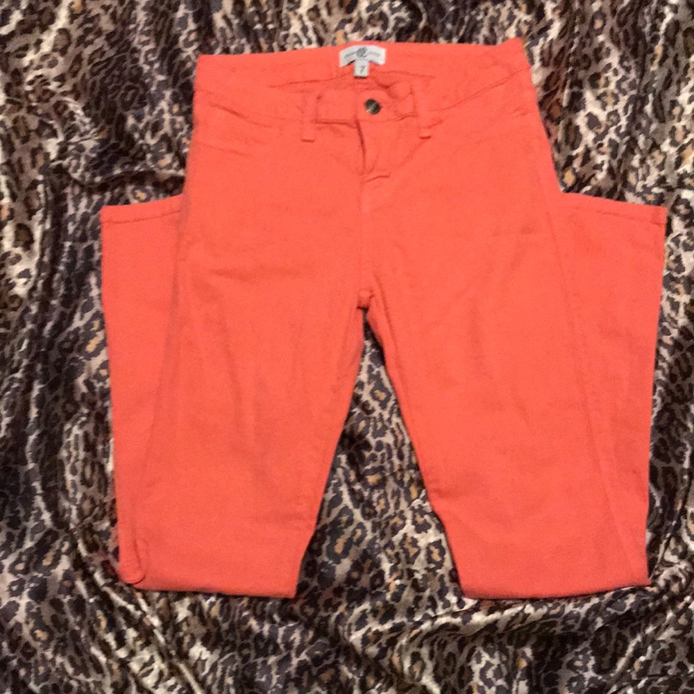 Salmon colored jeans